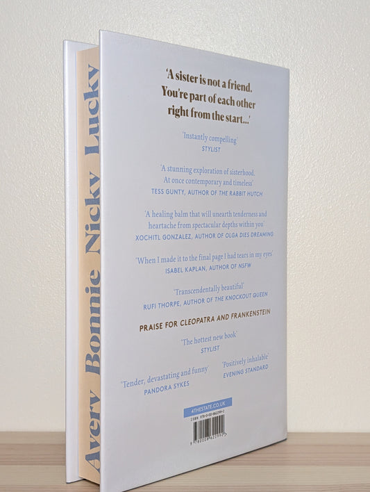 Blue Sisters by Coco Mellors (Signed First Edition with sprayed edges)
