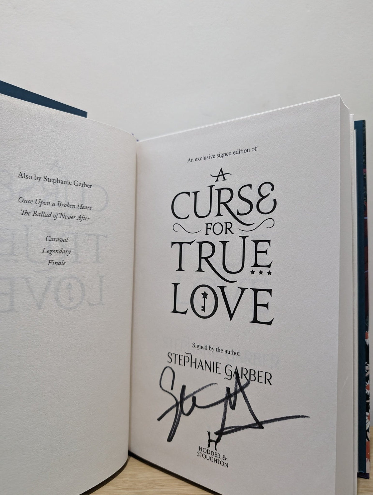 A Curse For True Love by Stephanie Garber (Signed Paw Cover) - Fialta Books