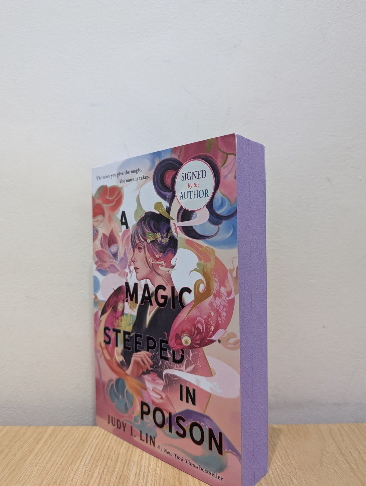 A Magic Steeped In Poison by Judy I. Lin (Signed First Edition with sprayed edges) - Fialta Books