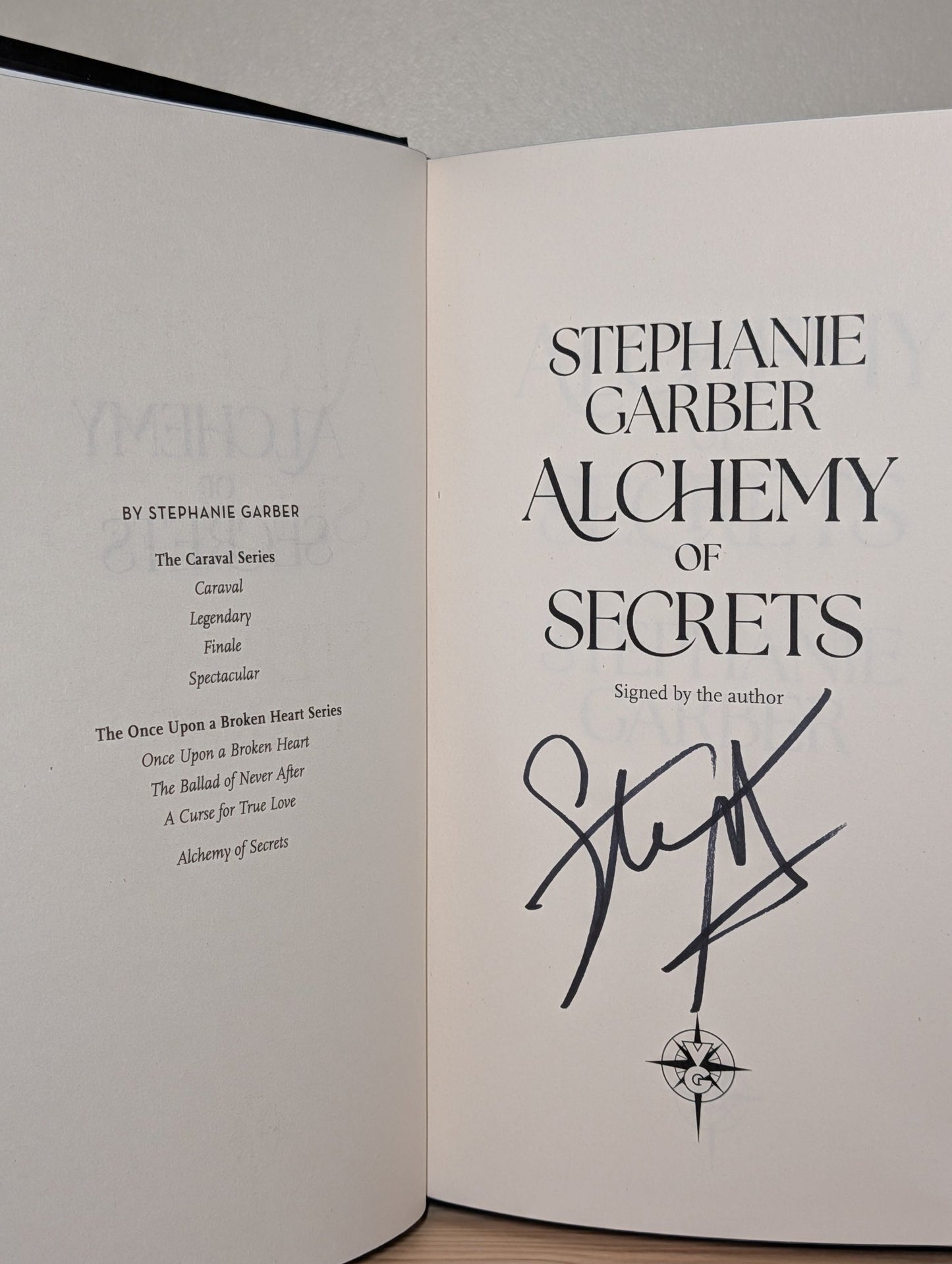 Alchemy of Secrets by Stephanie Garber (Signed with sprayed edges and cocktail cover) - Fialta Books