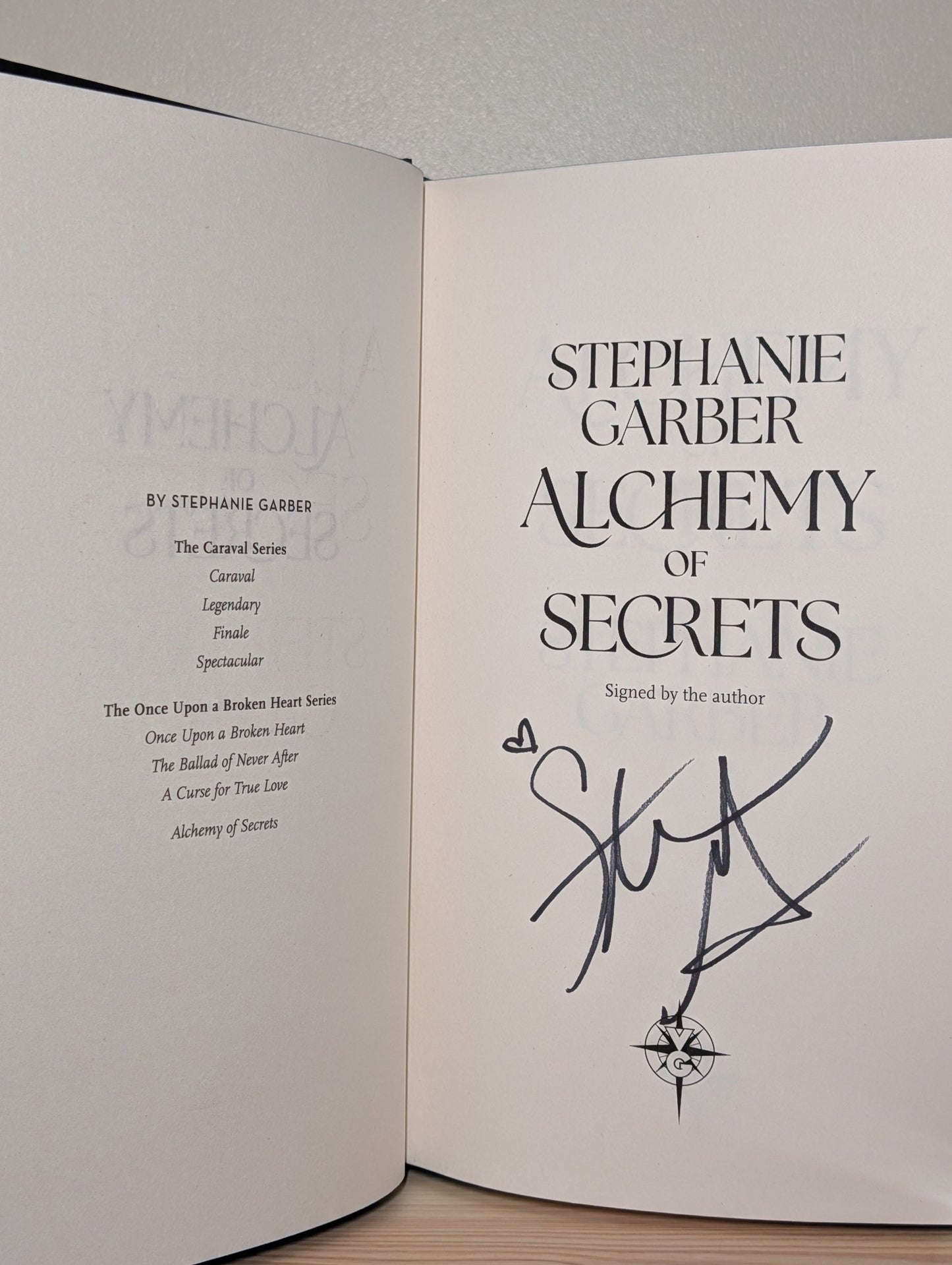 Alchemy of Secrets by Stephanie Garber (Signed with sprayed edges and devil cover) - Fialta Books