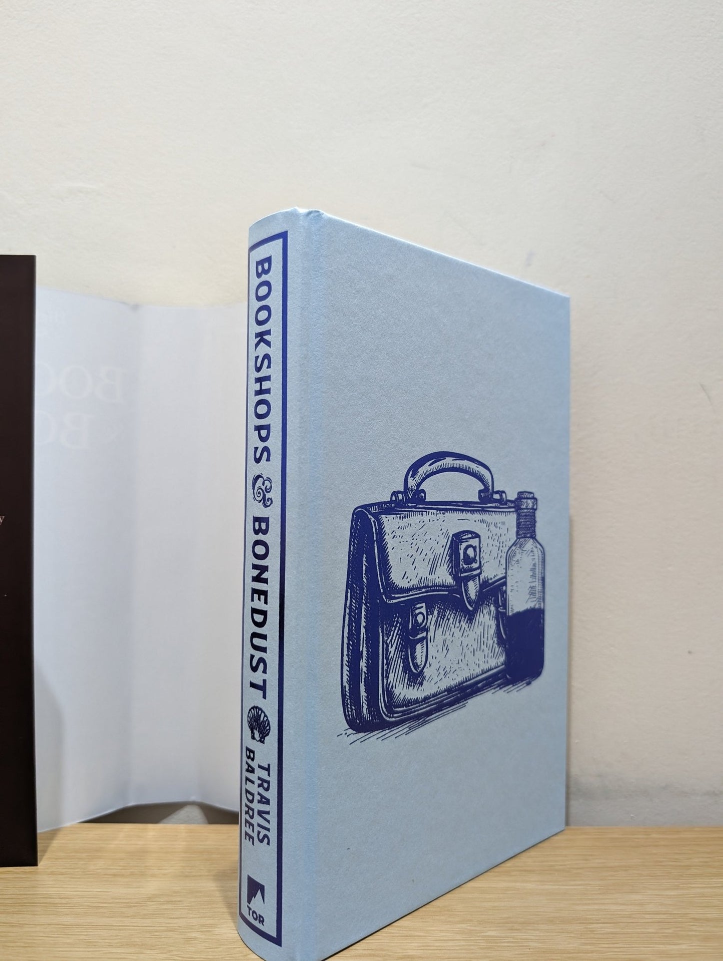 Bookshops & Bonedust by Travis Baldree (Signed First Edition with sprayed edges) - Fialta Books