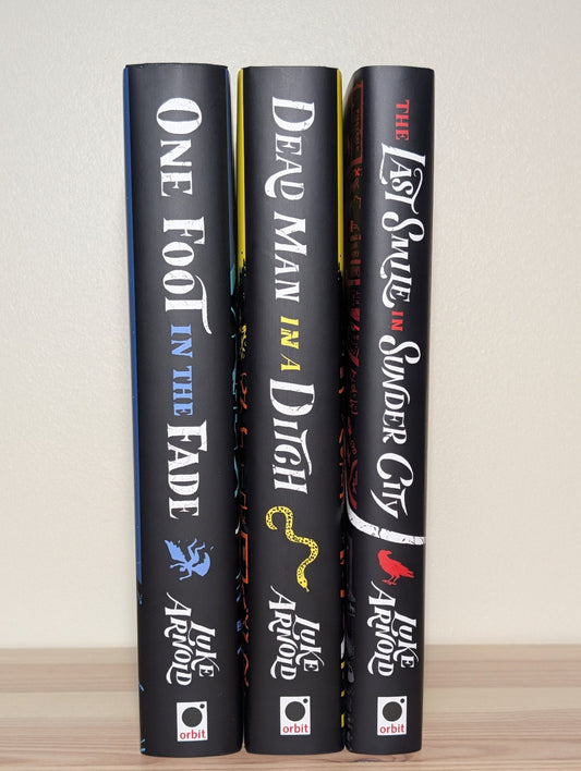 Last Smile in Sunder City; Dead Man in a Ditch by Luke Arnold; One Foot in the Fade (Signed with sprayed edges) - Fialta Books