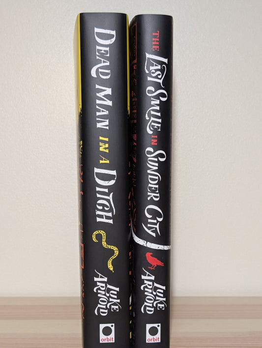 Last Smile in Sunder City; Dead Man in a Ditch by Luke Arnold (Signed with sprayed edges) - Fialta Books