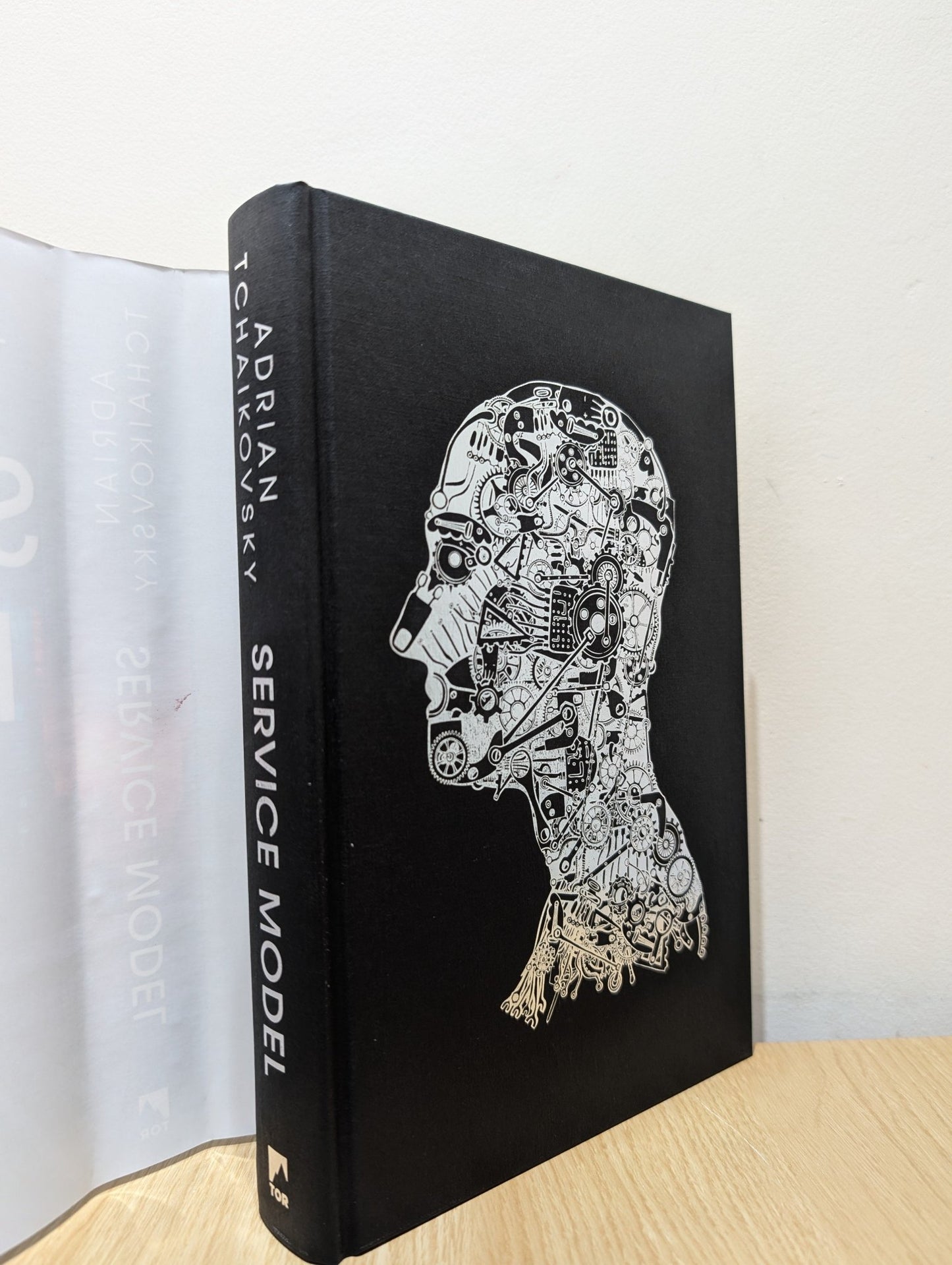 Service Model by Adrian Tchaikovsky (Signed First Edition with sprayed edges) - Fialta Books