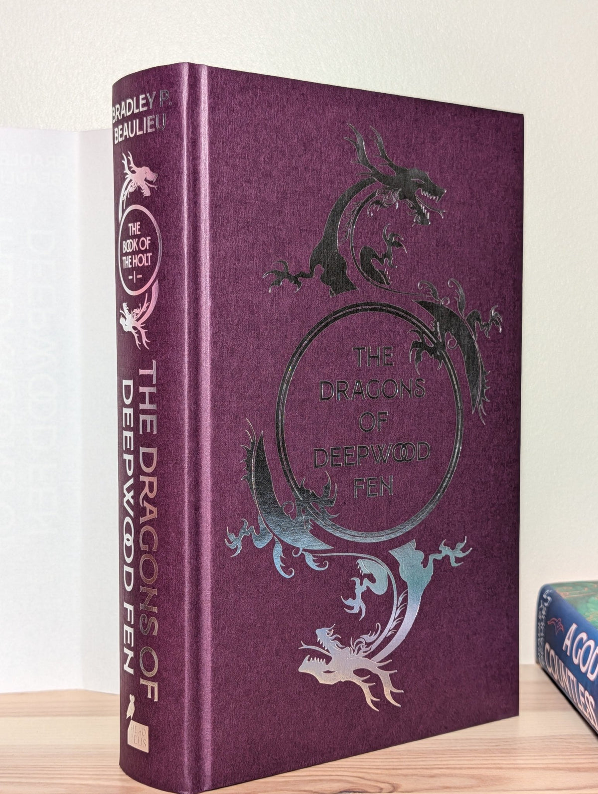 The Dragons of Deepwood Fen; A God of Countless Guises by Bradley P. Beaulieu (Signed First Edition with sprayed edges) - Fialta Books