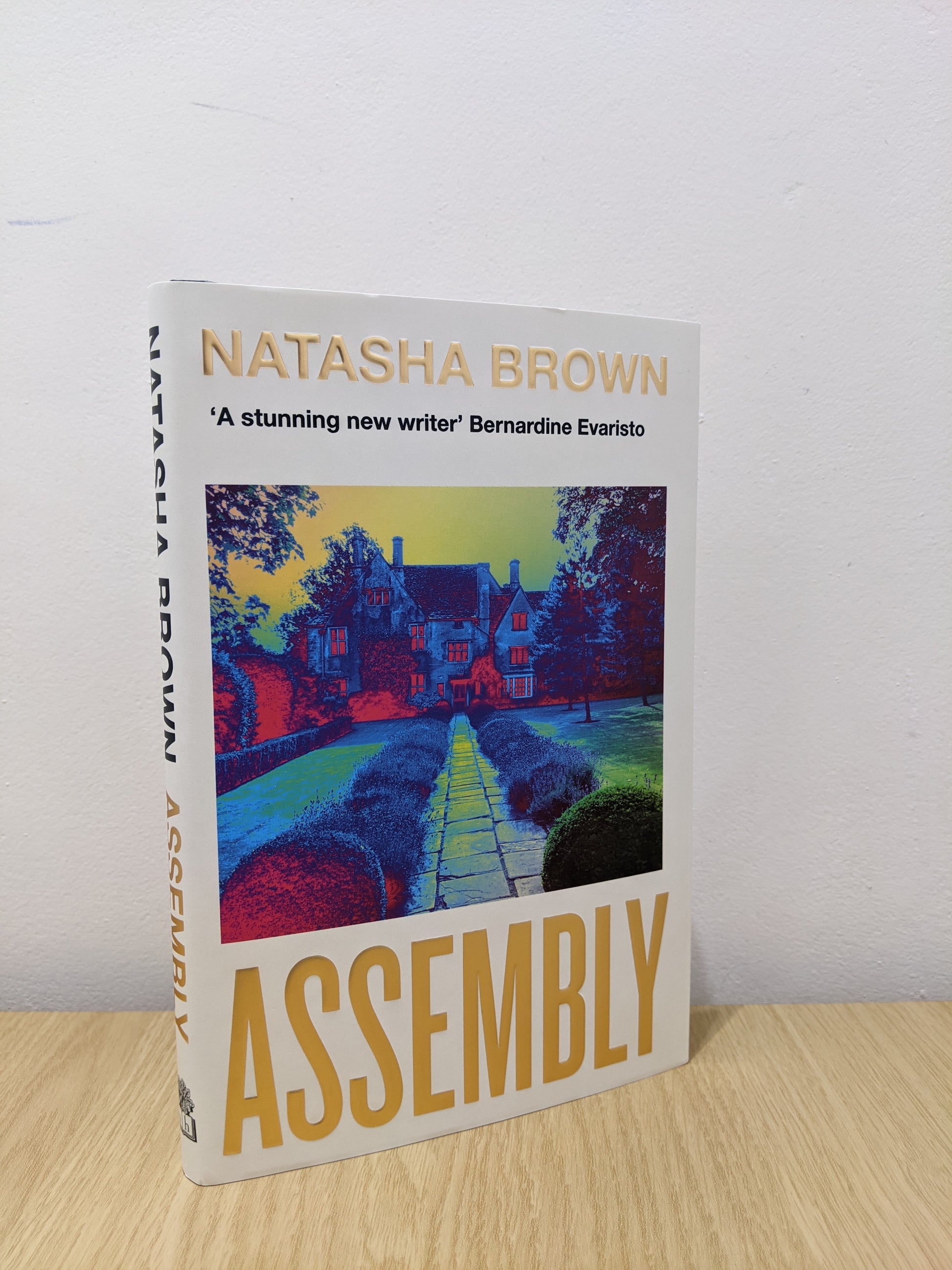 Assembly (Signed Numbered First Edition with gold foiled cover)