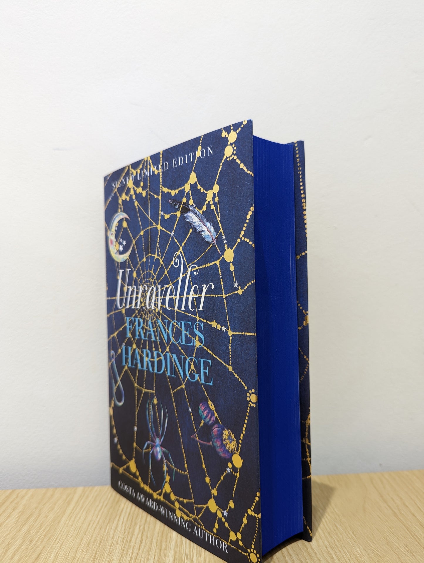 Unraveller (Signed Numbered First Edition with sprayed edges)