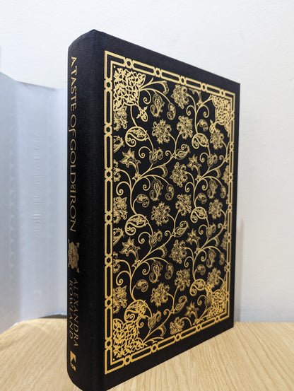 A Taste of Gold and Iron (Signed First Edition with sprayed edges)