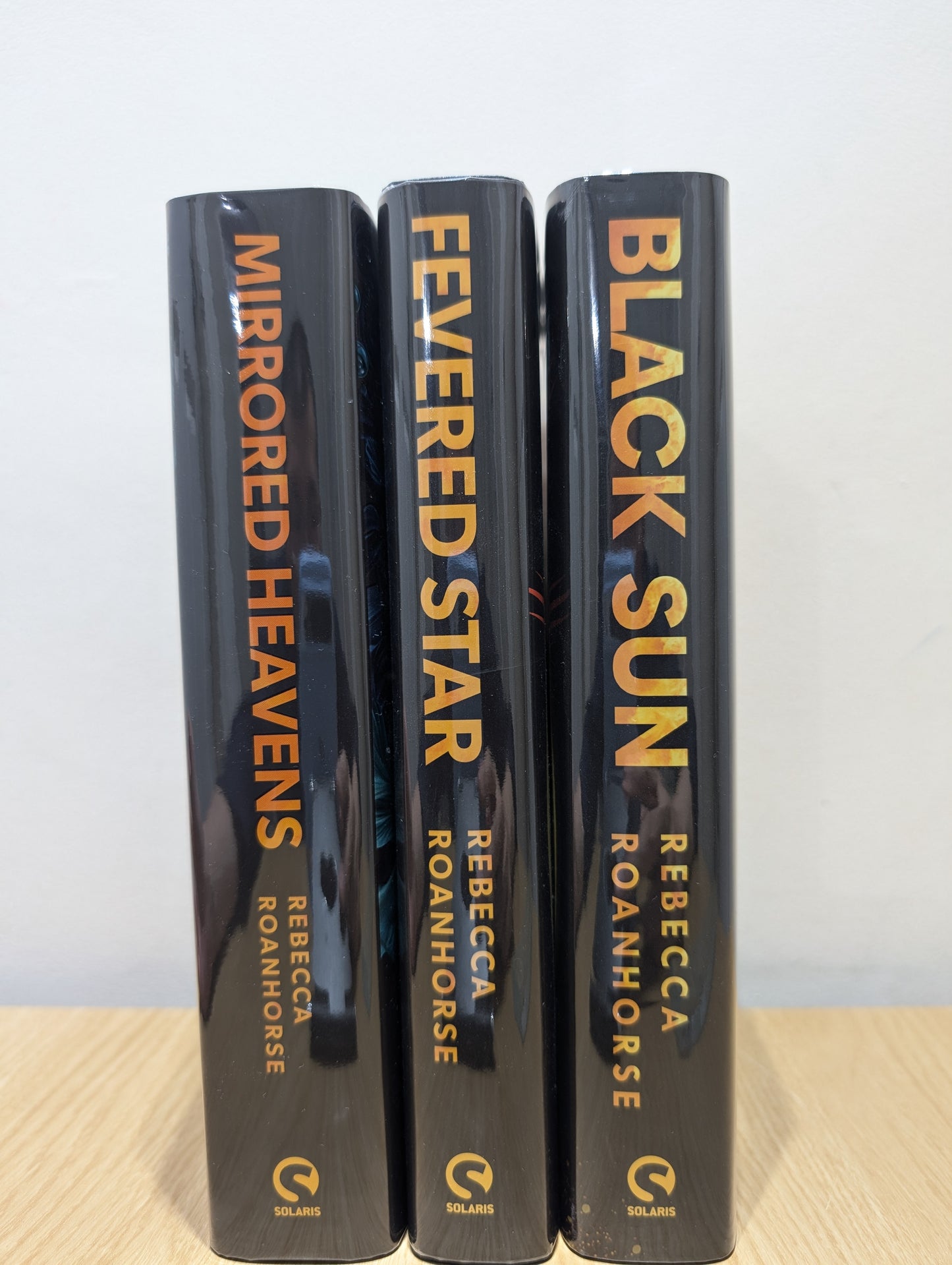 Black Sun;  Fevered Star; Mirrored Heavens (Between Earth and Sky 1-3) (Signed Numbered First Edition with sprayed edges)