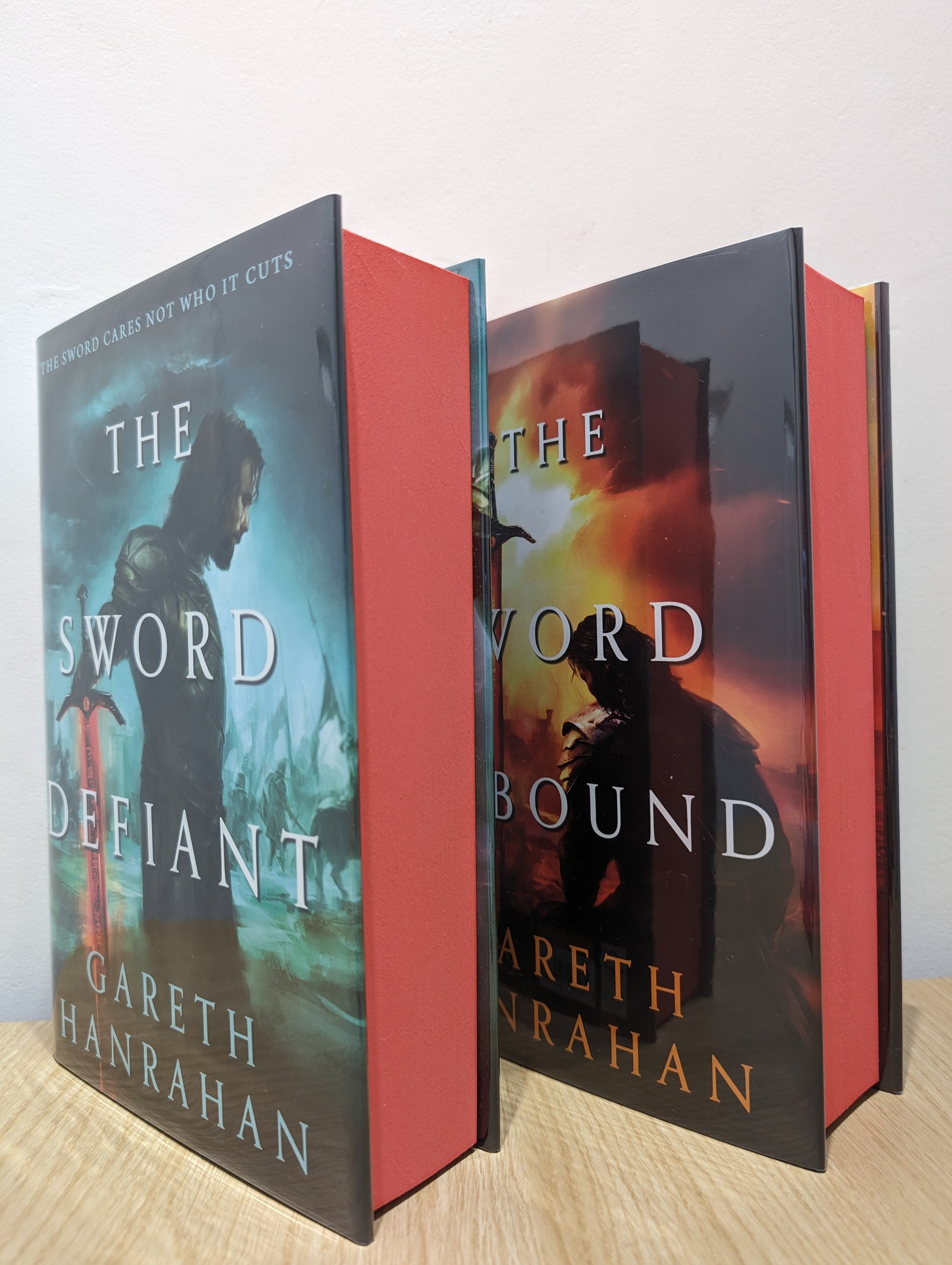 The Sword Defiant; The Sword Unbound: Lands of the Firstborn 1-2 (Signed Numbered First Edition with sprayed edges)