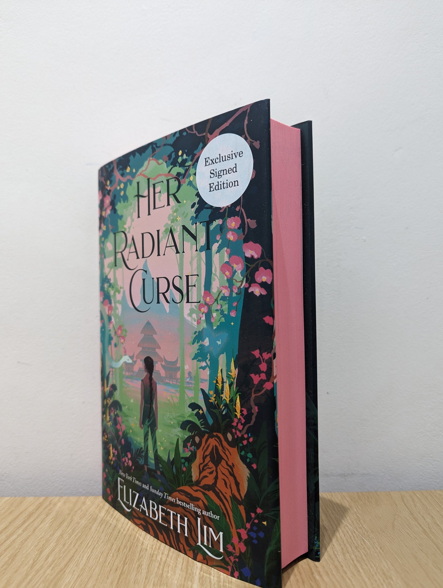 Her Radiant Curse: An enchanting fantasy, set in the same world as New York Times bestselling Six Crimson Cranes (Signed First Edition with sprayed edges)