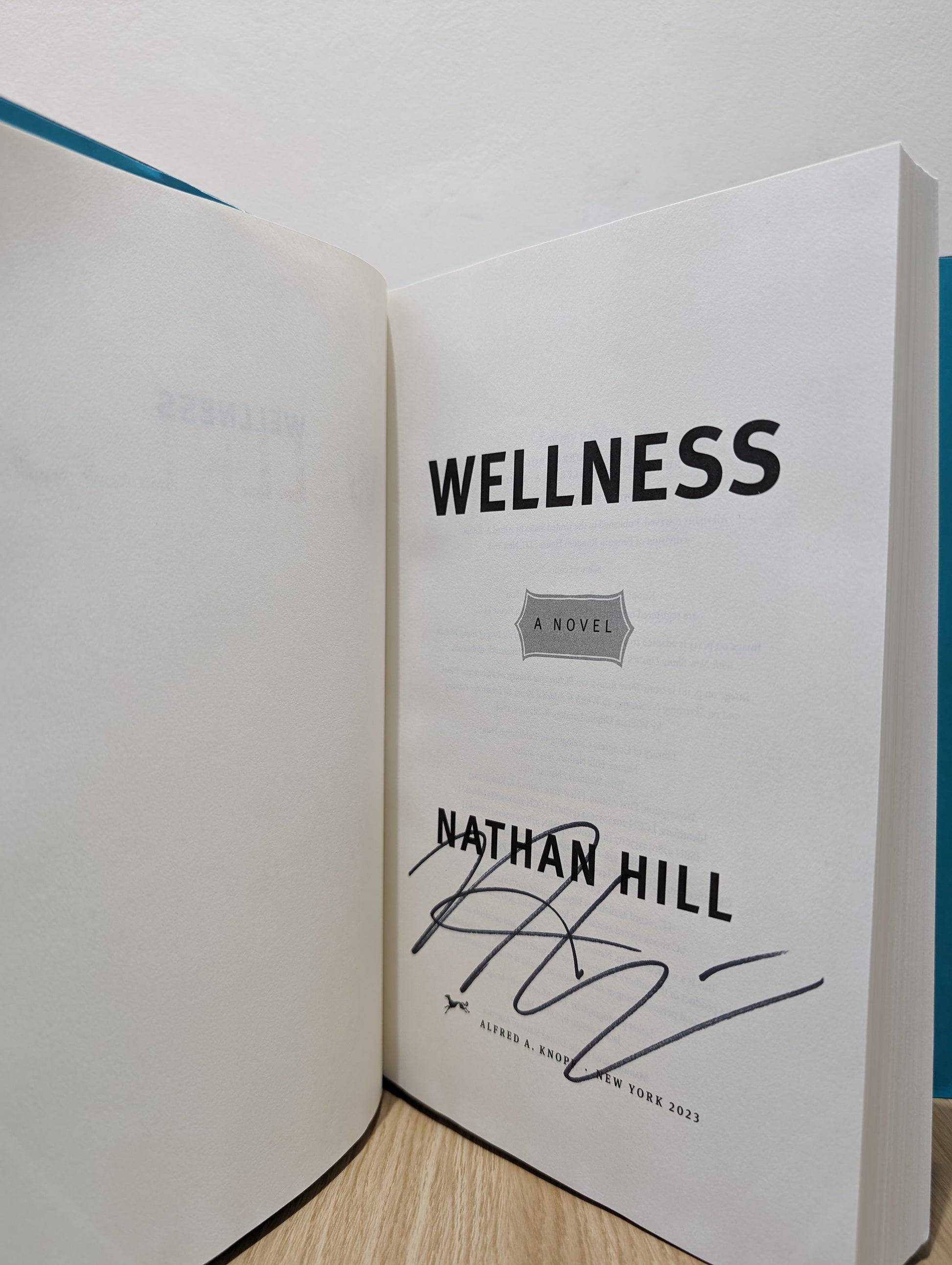 Wellness: A novel (Signed First Edition)