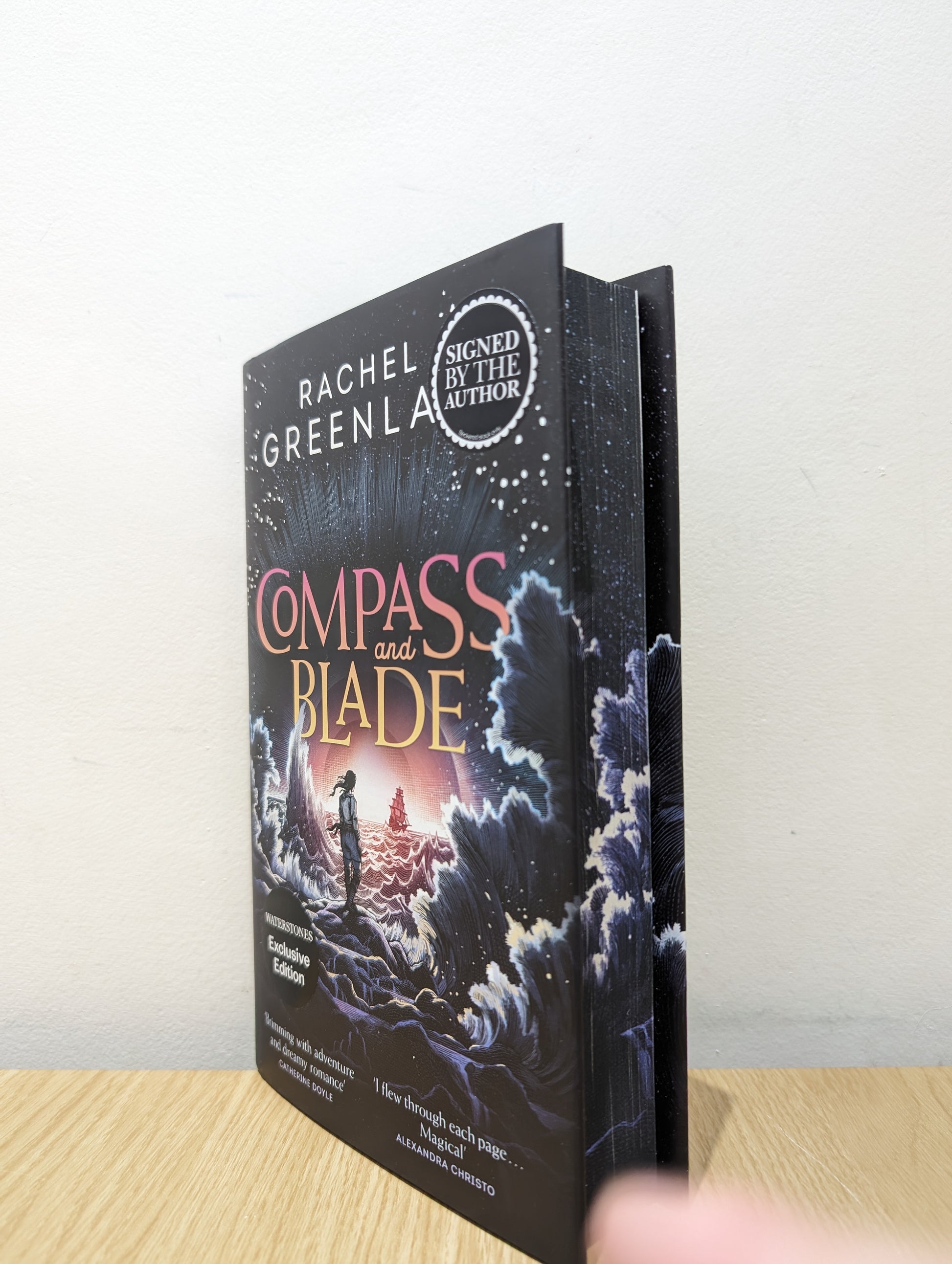 Compass and Blade (Signed First Edition with sprayed edges)