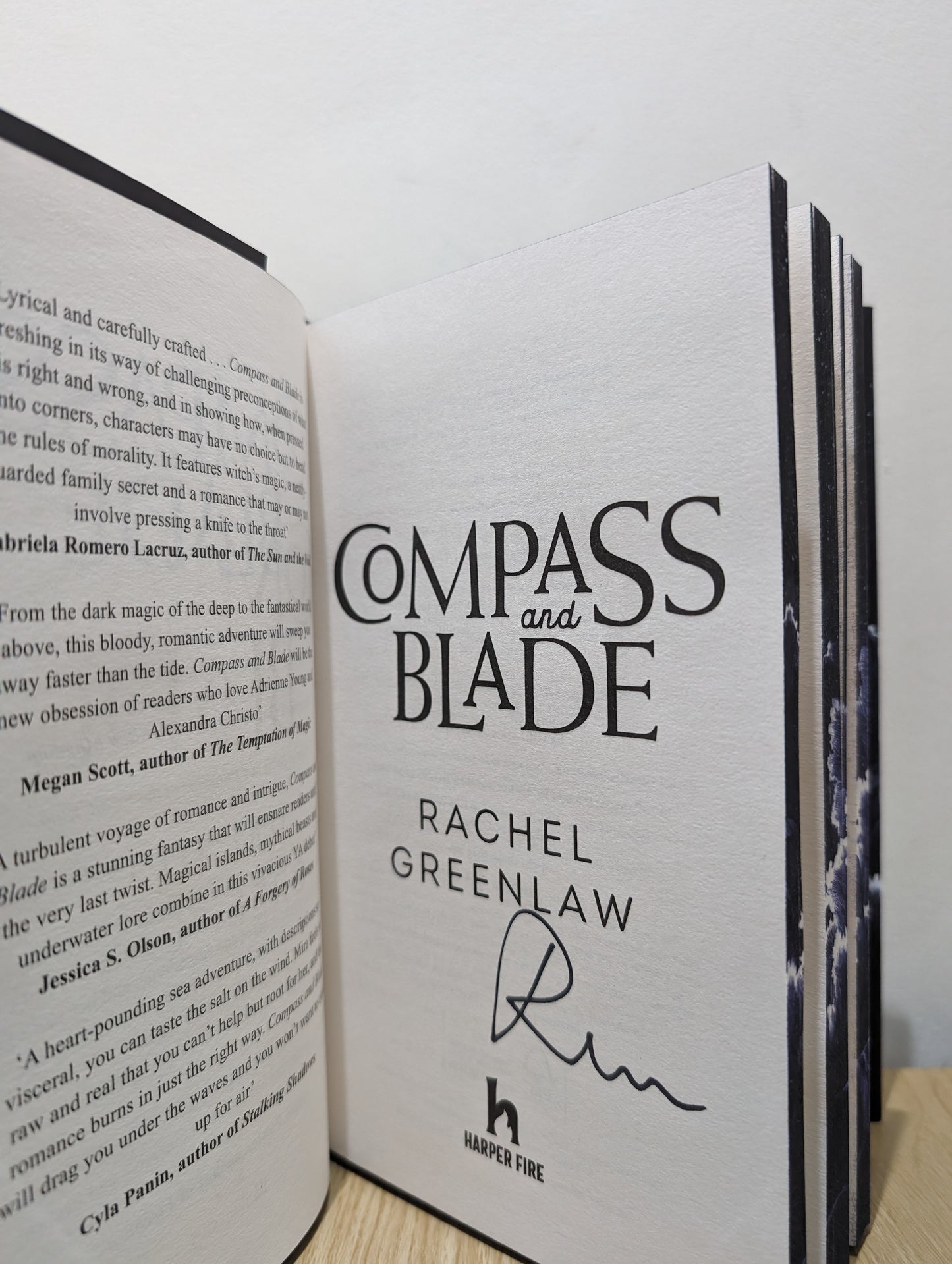 Compass and Blade (Signed First Edition with sprayed edges)