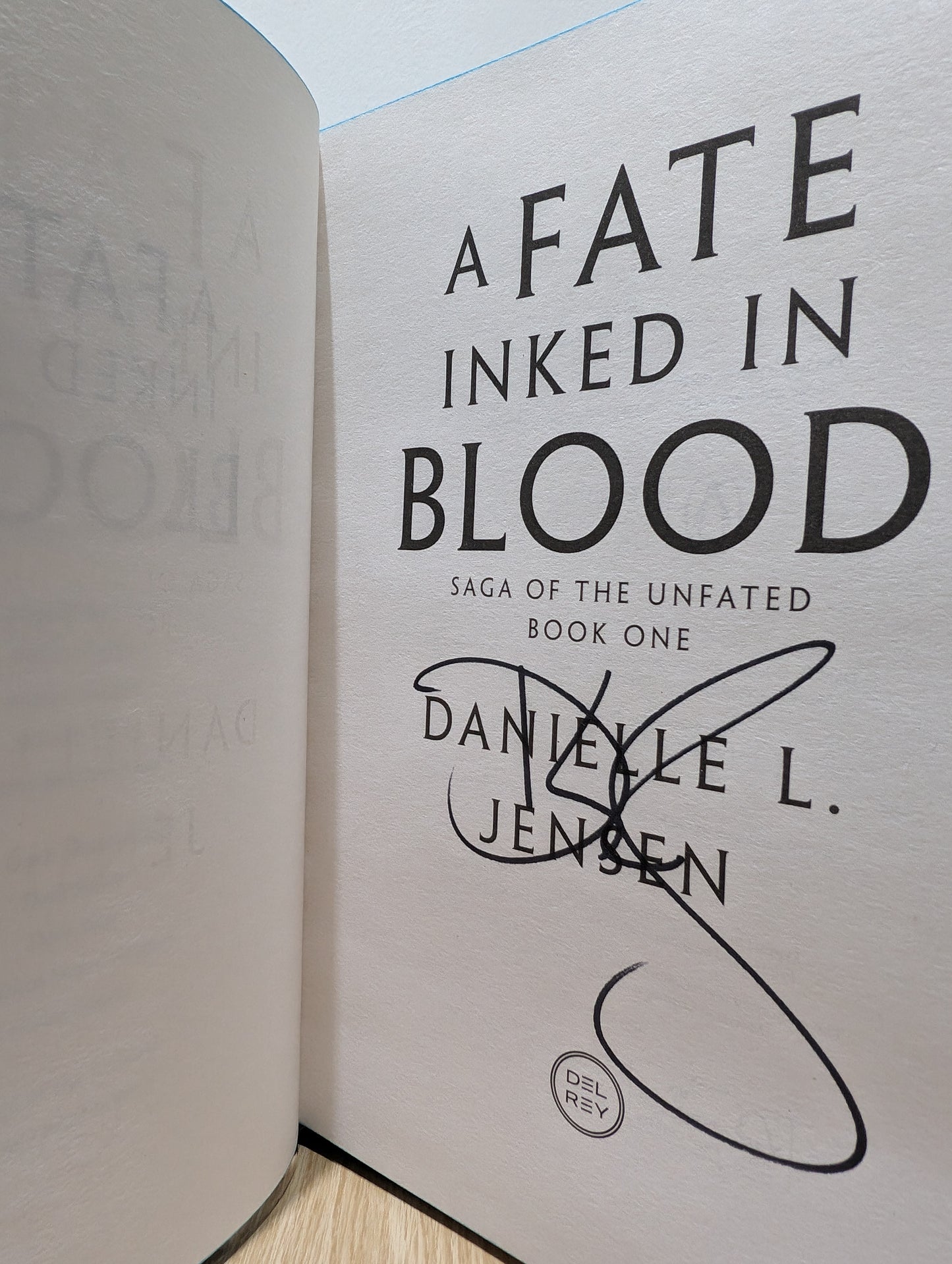 A Fate Inked in Blood (Signed First Edition with sprayed edges and foiled boards)