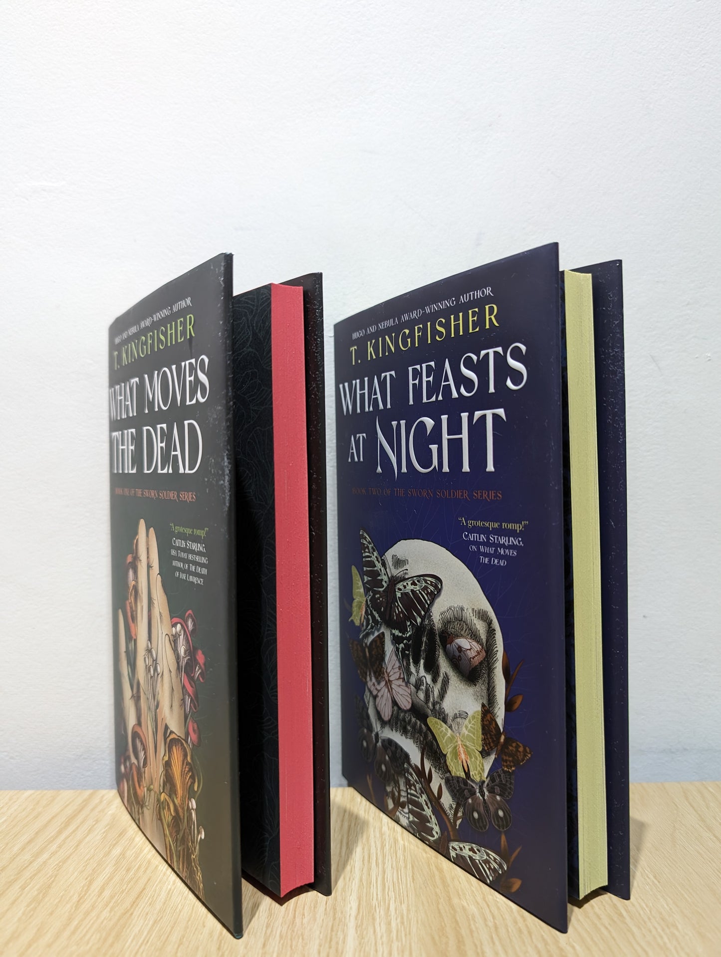 Sworn Soldier: What moves the Dead; What feasts at Night (First Edition Set with sprayed edges)