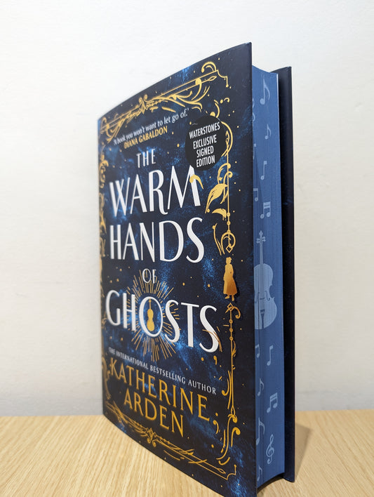 The Warm Hands of Ghosts (Signed First Edition with sprayed edges)