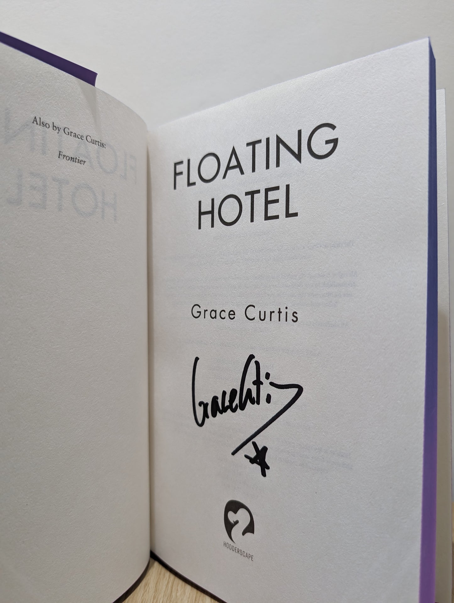 Floating Hotel: from author of Frontier (Signed First Edition with sprayed edges)