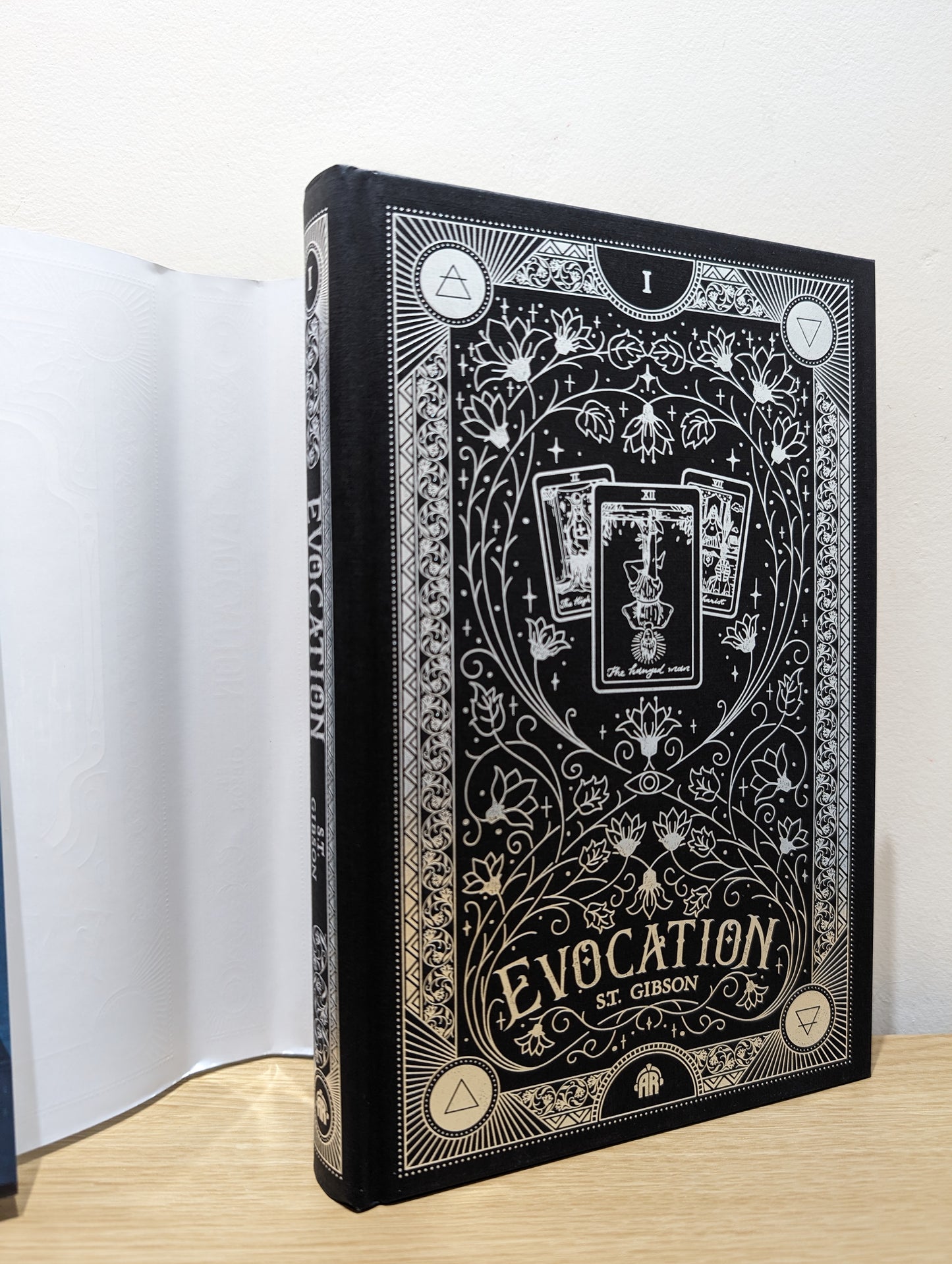 Evocation: Book I in The Summoner's Circle (First Edition with sprayed edges)