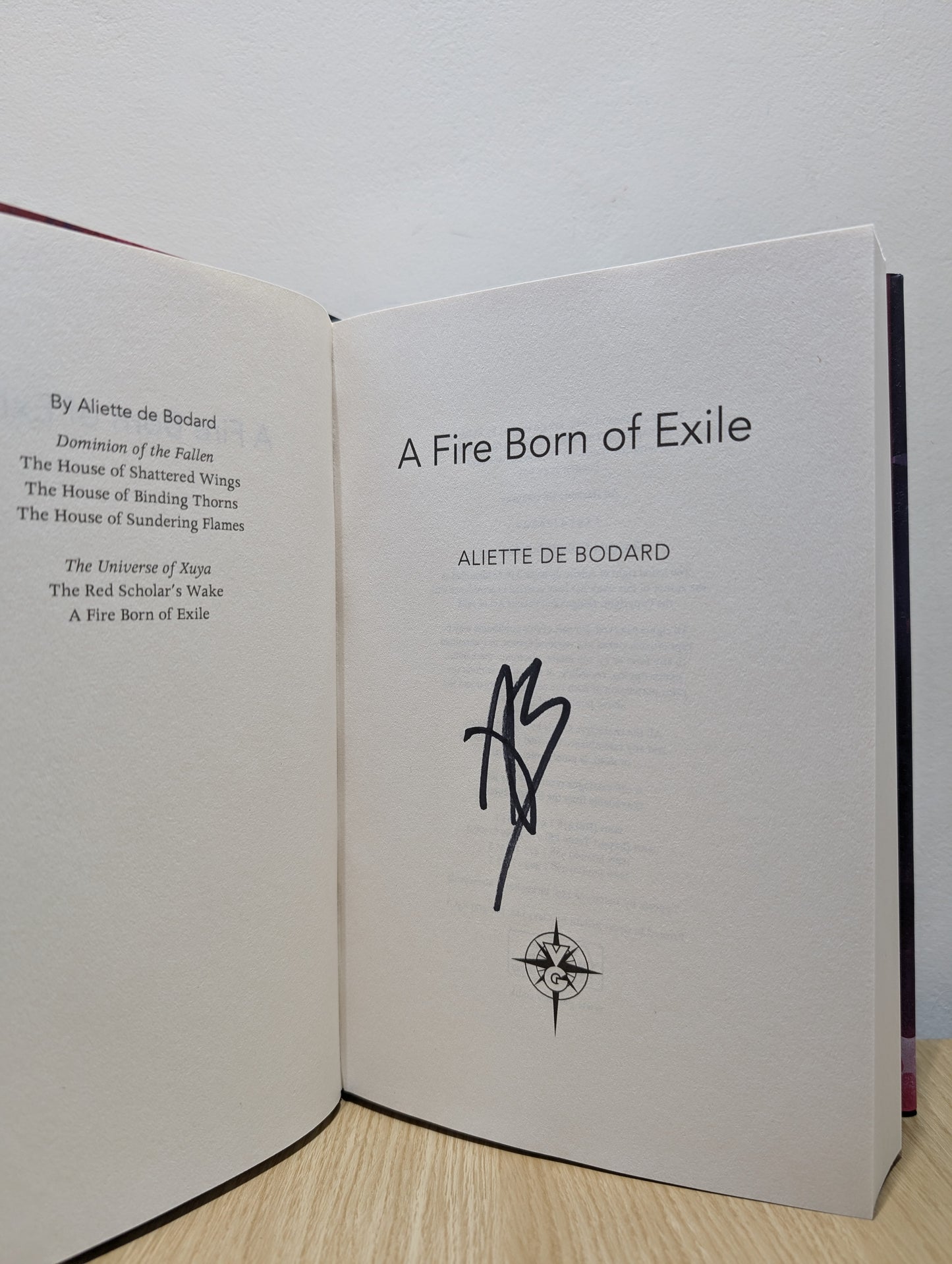 A Fire Born of Exile: A Xuya Universe Novel (Signed First Edition)