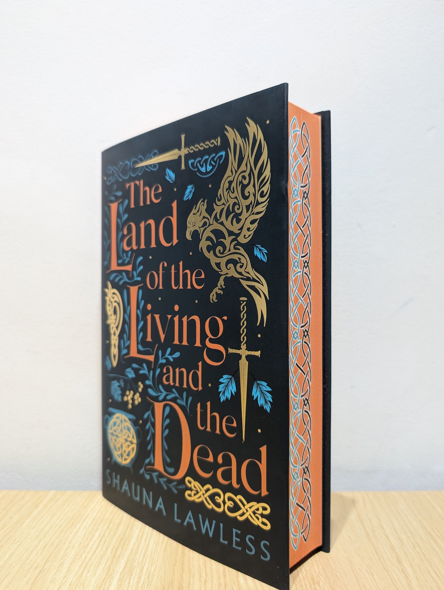 The Land of the Living and the Dead (Signed First Edition with sprayed edges)