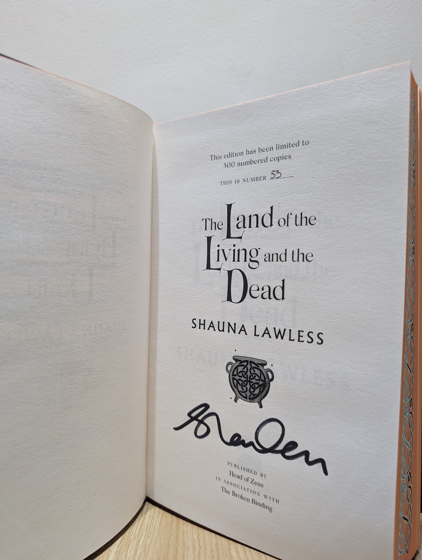 The Land of the Living and the Dead (Signed First Edition with sprayed edges)