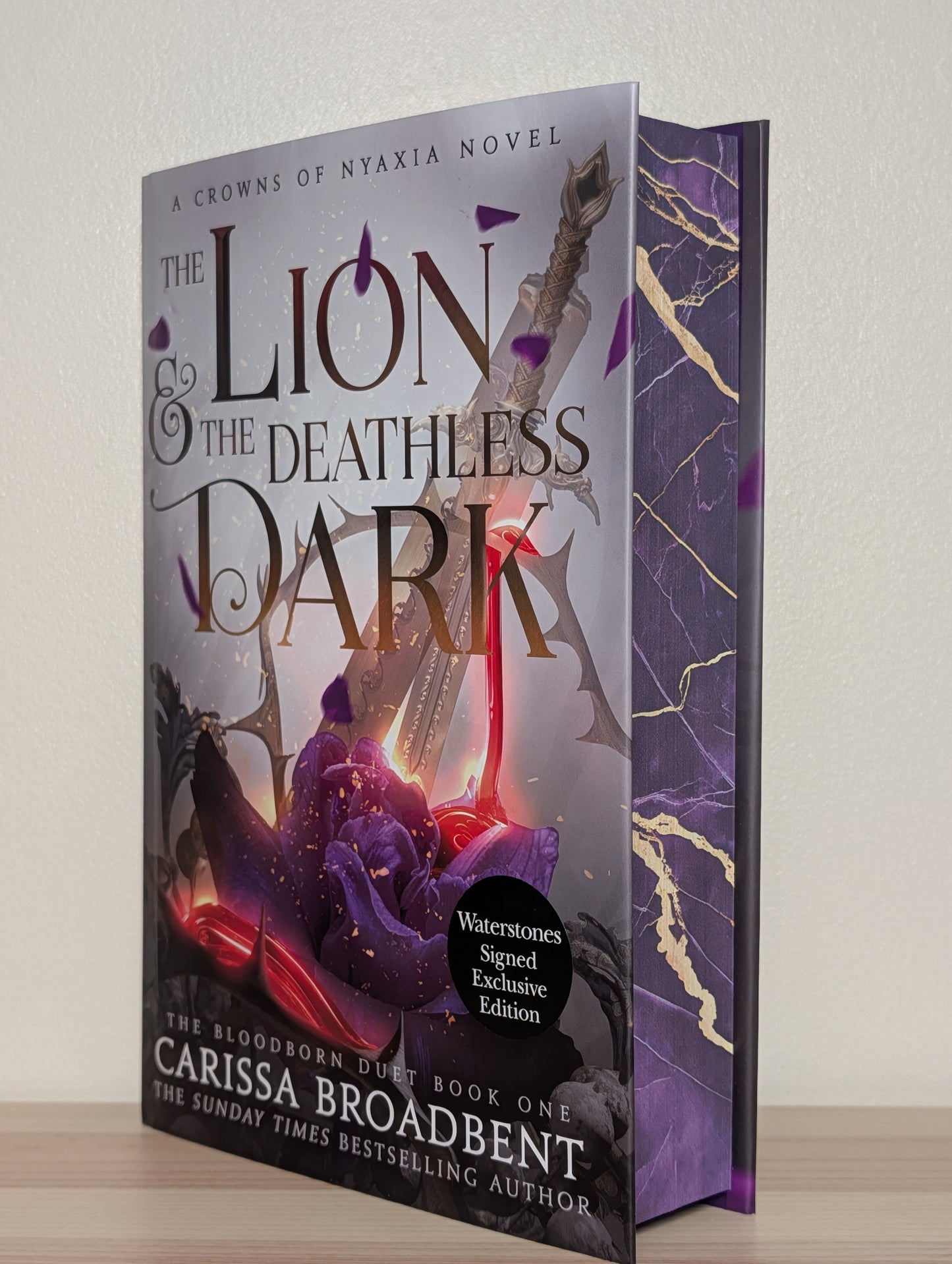 The Lion and the Deathless Dark by Carissa Broadbent (Signed First Edition with sprayed edges)