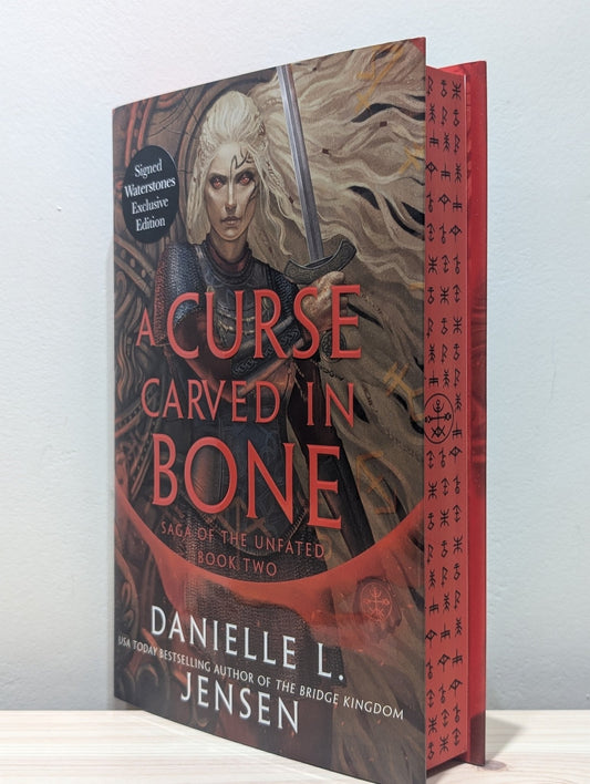 A Curse Carved in Bone by Danielle L. Jensen (Signed First Edition with sprayed edges) - Fialta Books
