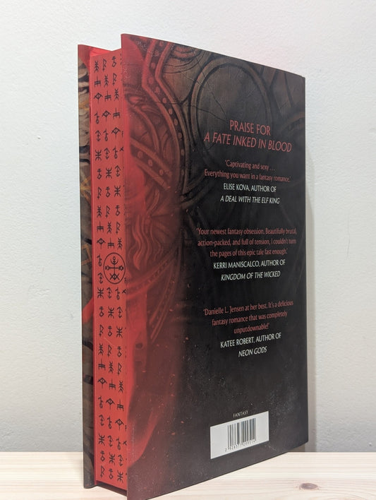 A Curse Carved in Bone by Danielle L. Jensen (Signed First Edition with sprayed edges) - Fialta Books
