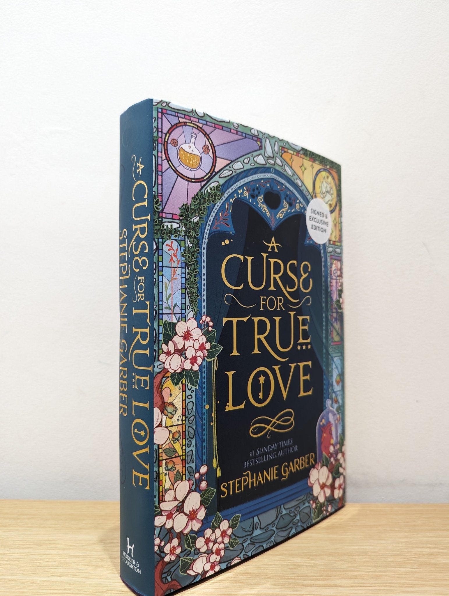A Curse For True Love by Stephanie Garber (Signed Apple Cover) - Fialta Books