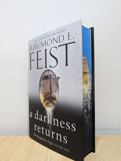 A Darkness Returns: The Dragonwar Saga Book 1 by Raymond E. Feist (Signed First Edition with sprayed edges) - Fialta Books