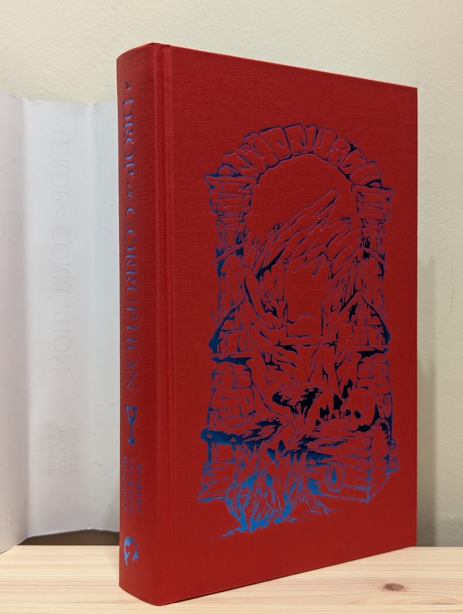 A Drop of Corruption by Robert Jackson Bennett (Signed First Edition with sprayed edges) - Fialta Books