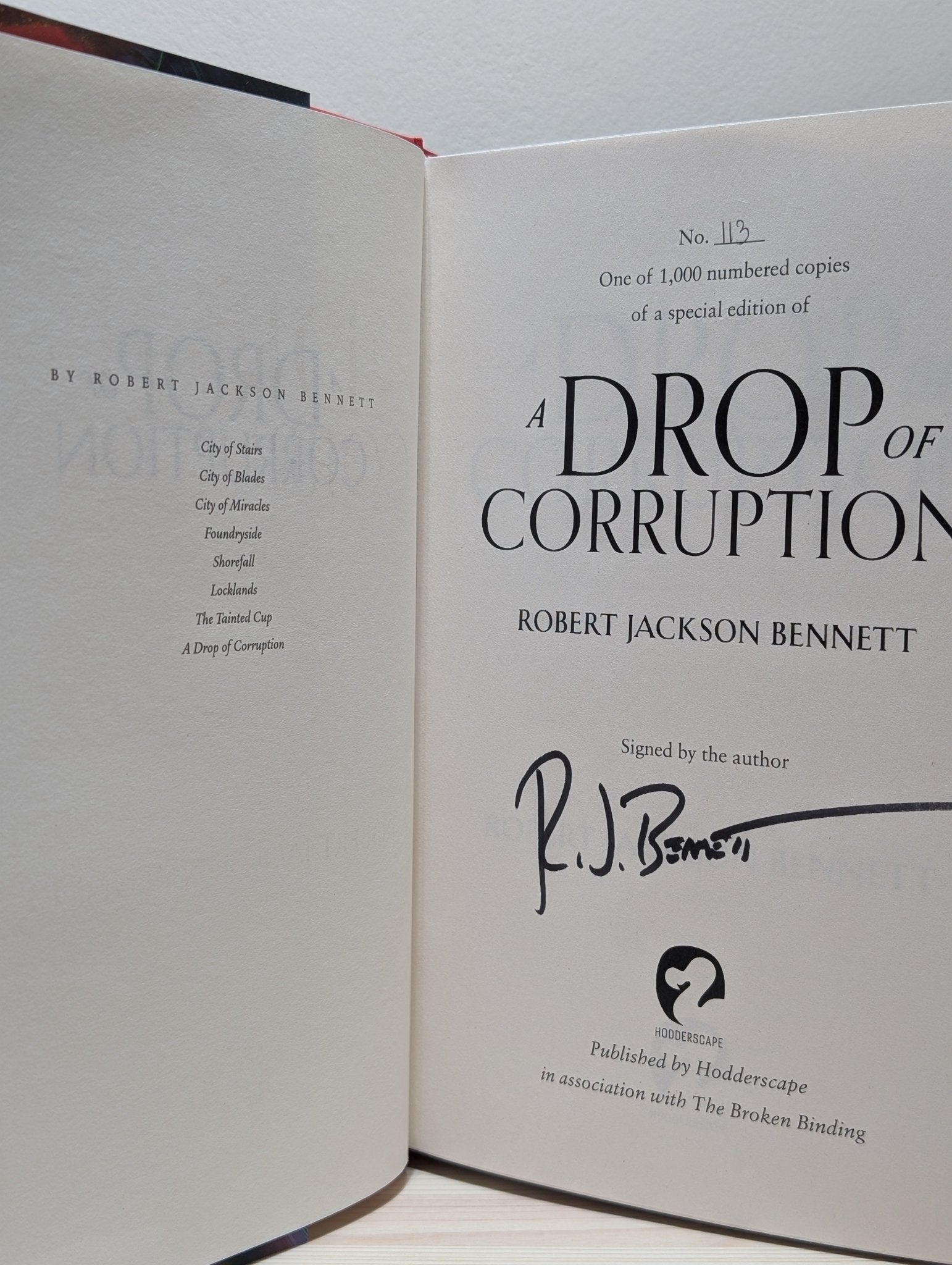 A Drop of Corruption by Robert Jackson Bennett (Signed First Edition with sprayed edges) - Fialta Books