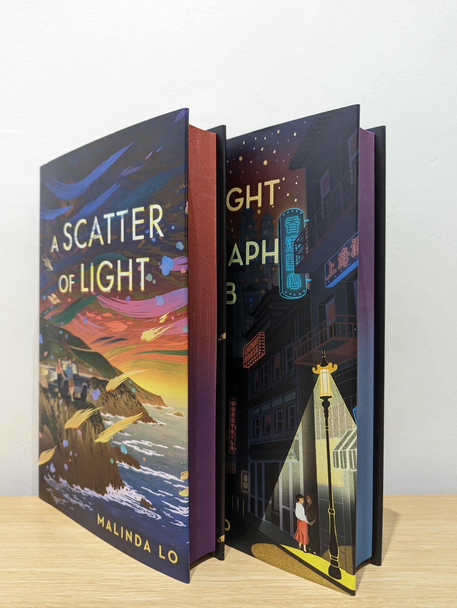 A Scatter of Light; Last Night at the Telegraph Club by Malinda Lo (Signed Set with sprayed edges) - Fialta Books