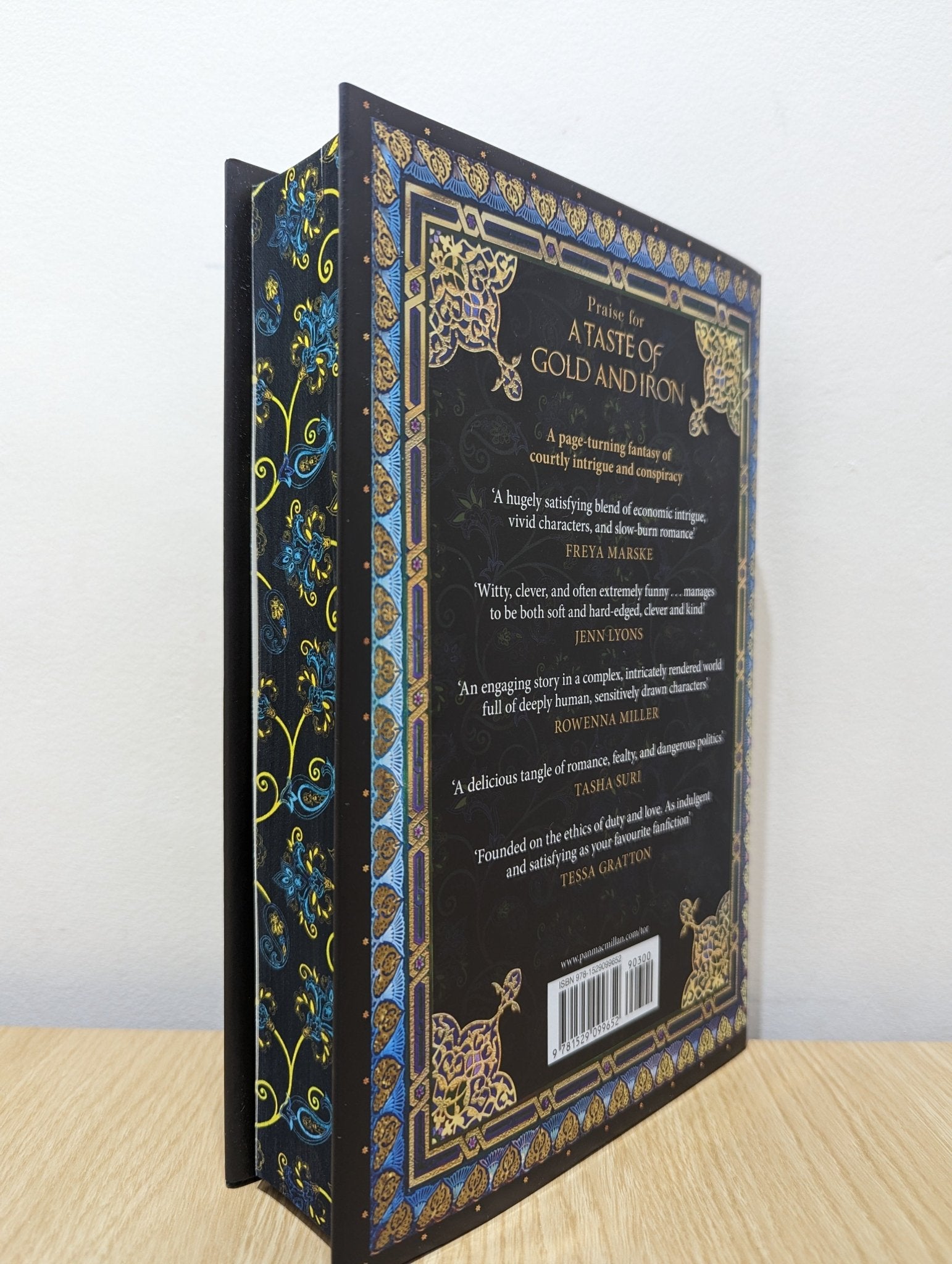 A Taste of Gold and Iron by Alexandra Rowland (Signed First Edition with sprayed edges) - Fialta Books