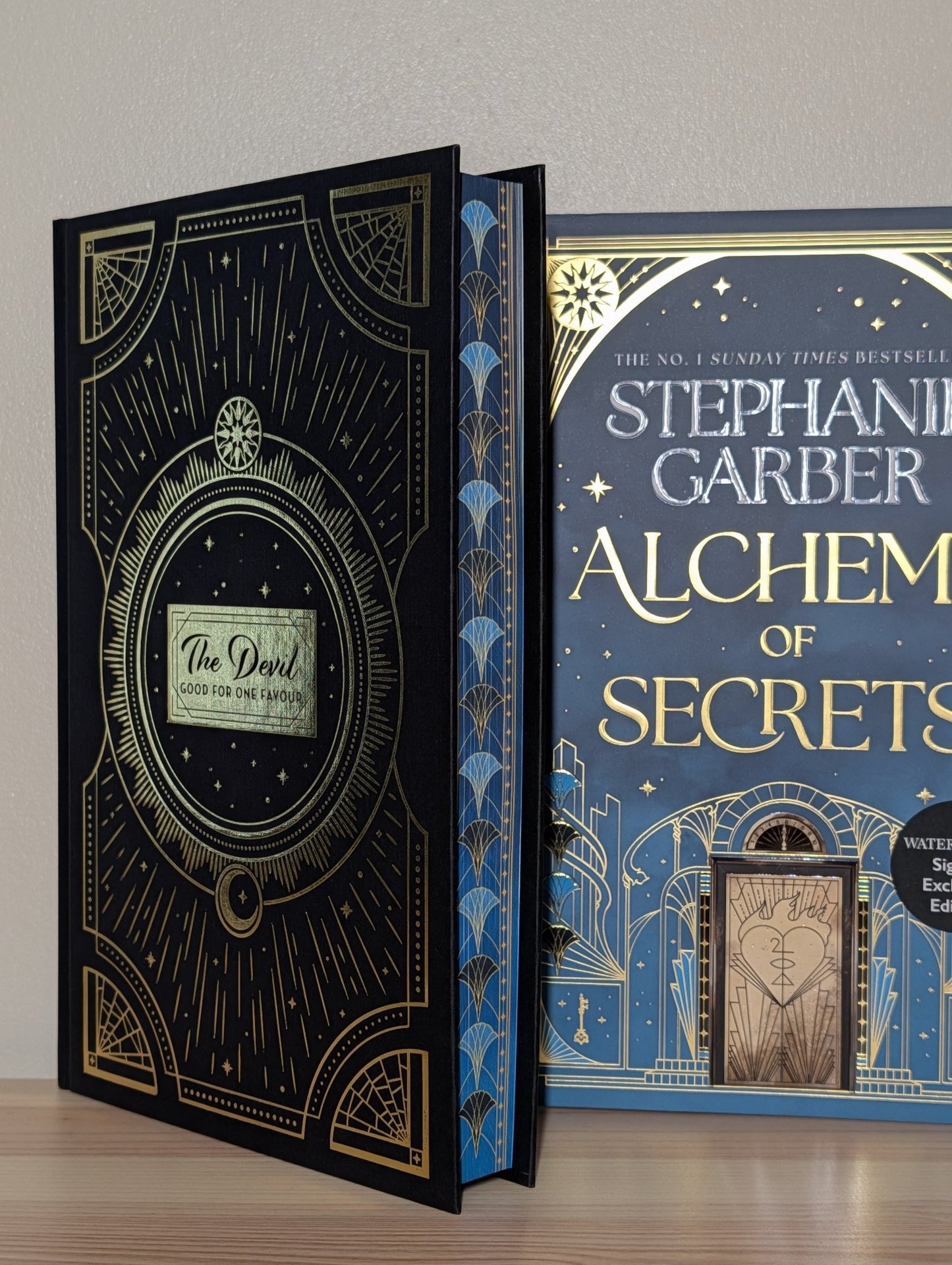 Alchemy of Secrets by Stephanie Garber (Signed with sprayed edges and devil cover) - Fialta Books
