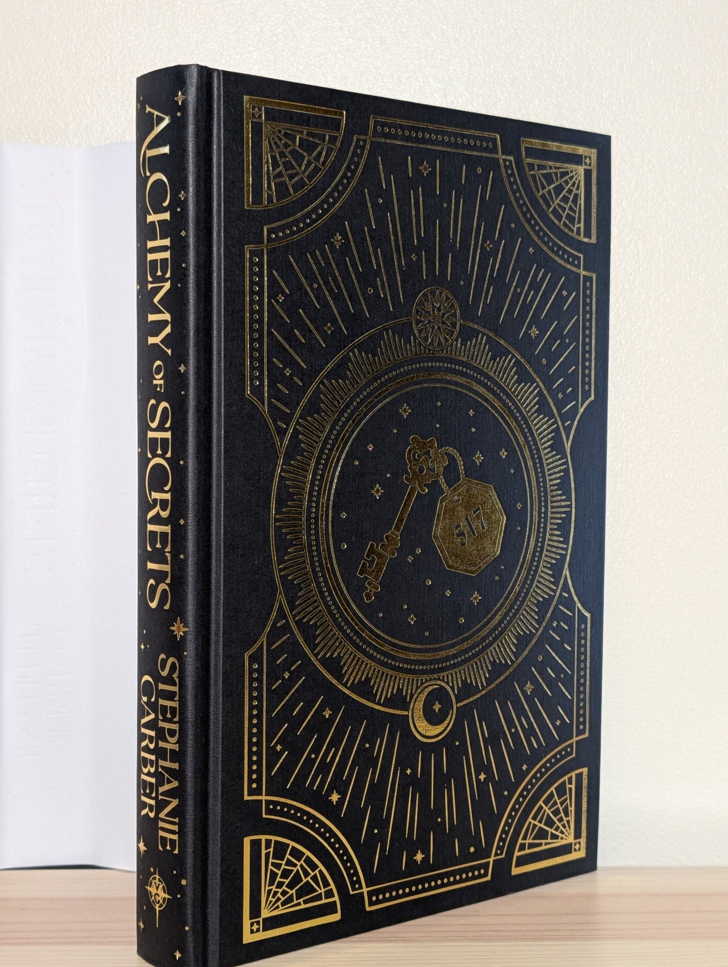 Alchemy of Secrets by Stephanie Garber (Signed with sprayed edges and key cover) - Fialta Books