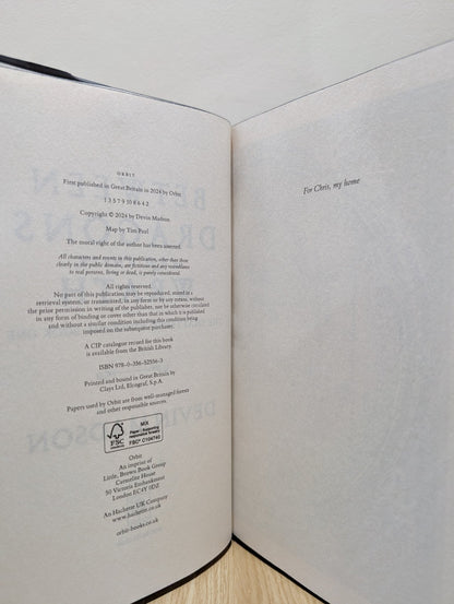 Between Dragons and Their Wrath by Devin Madson (Signed First Edition with sprayed edges) - Fialta Books