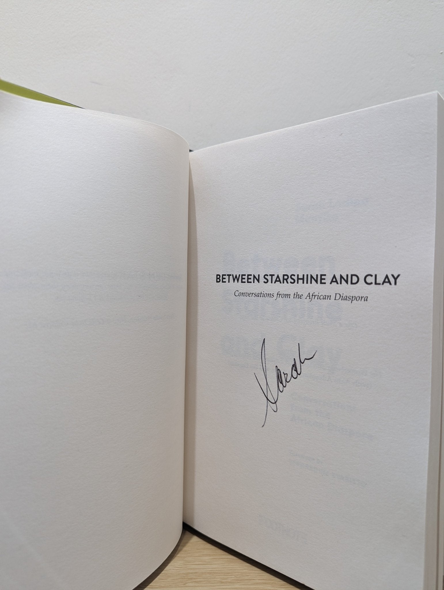 Between Starshine and Clay by Sarah Ladipo Manyika (Signed First Edition) - Fialta Books