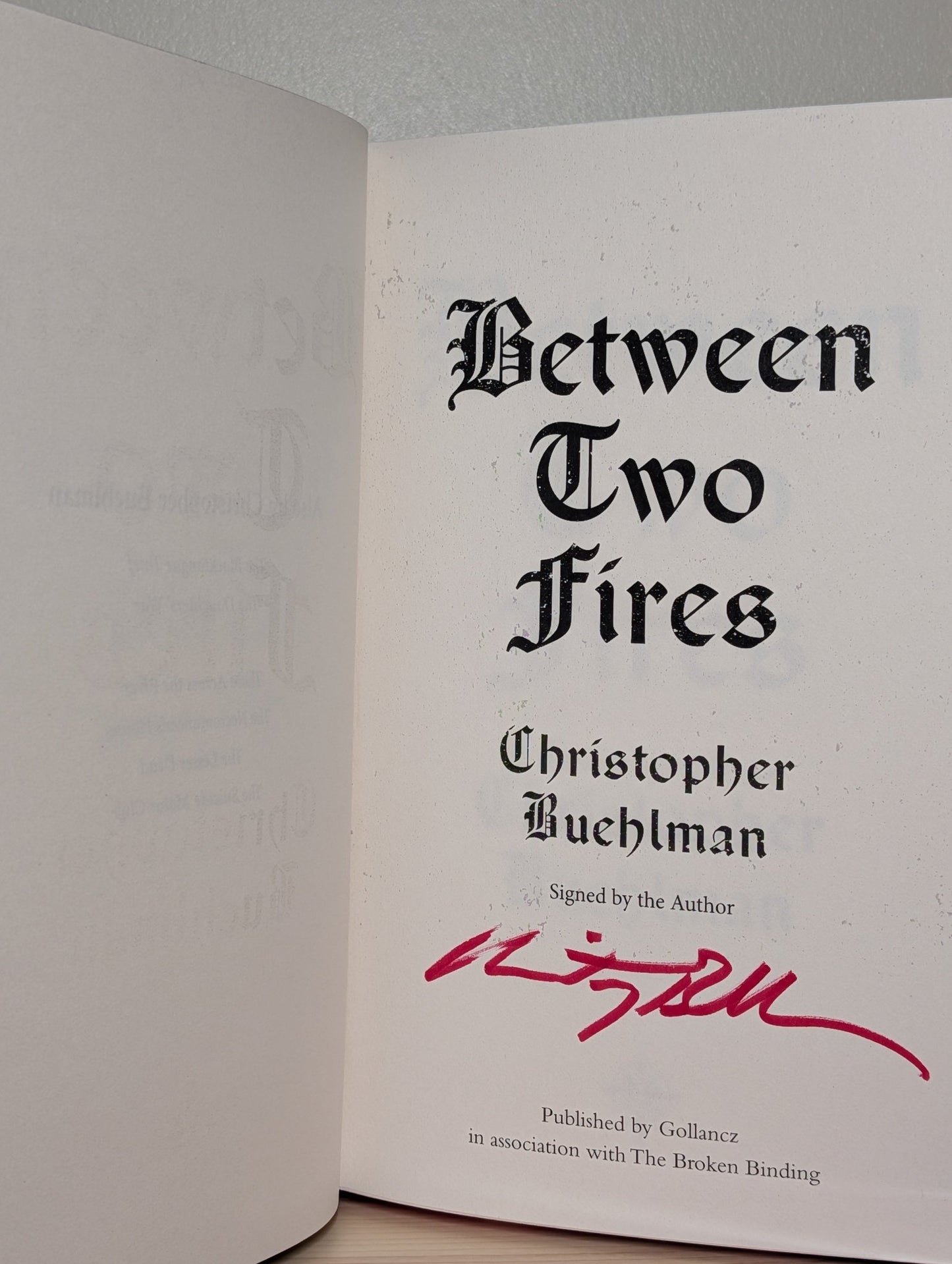 Between Two Fires by Christopher Buehlman (Signed with sprayed edges) - Fialta Books