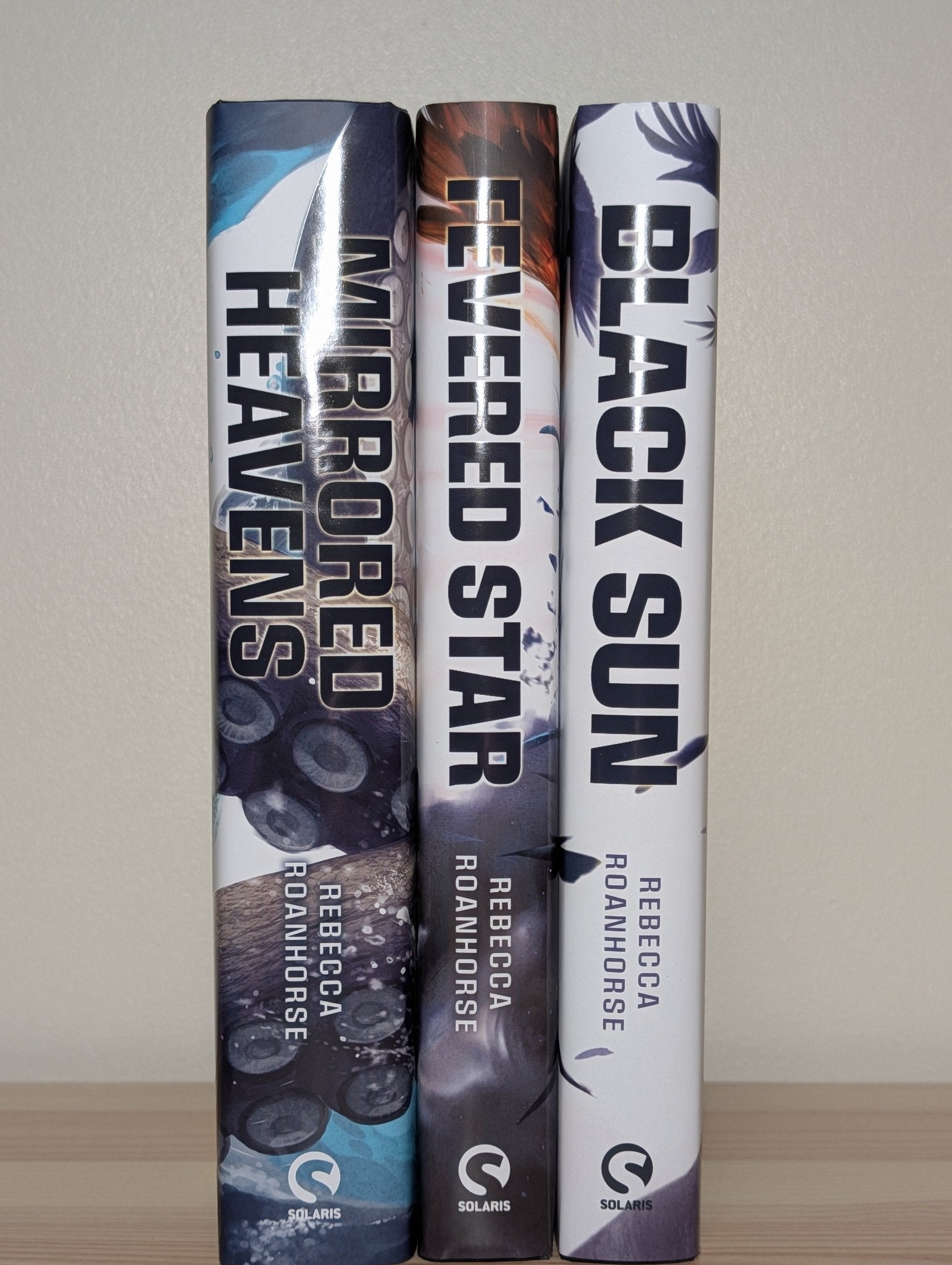 Black Sun; Fevered Star; Mirrored Heavens by Rebecca Roanhorse (Special Edition with sprayed edges) - Fialta Books