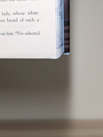 Bookshops & Bonedust by Travis Baldree (Signed Bookplate with sprayed edges) - Fialta Books