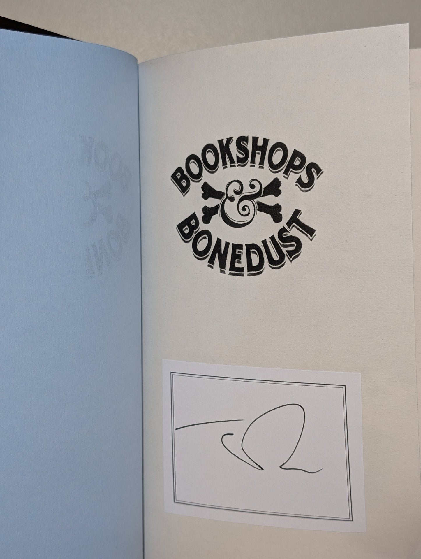 Bookshops & Bonedust by Travis Baldree (Signed Bookplate with sprayed edges) - Fialta Books