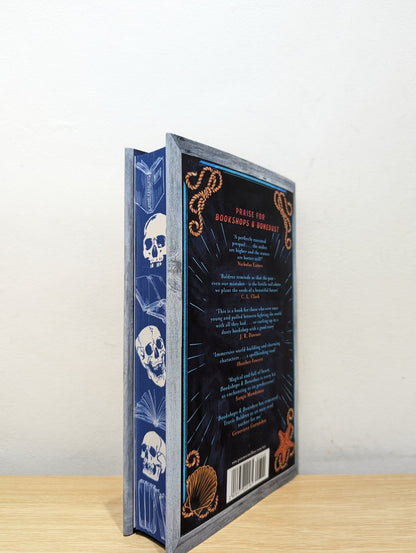 Bookshops & Bonedust by Travis Baldree (Signed First Edition with sprayed skull edges) - Fialta Books