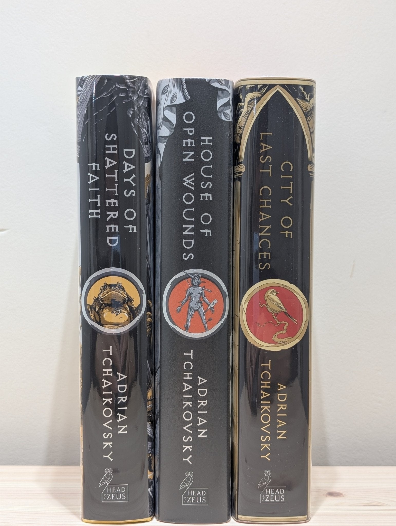 City of Last Chances; House of Open Wounds; Days of Shattered Faith by Adrian Tchaikovsky (Signed First Set with sprayed edges) - Fialta Books