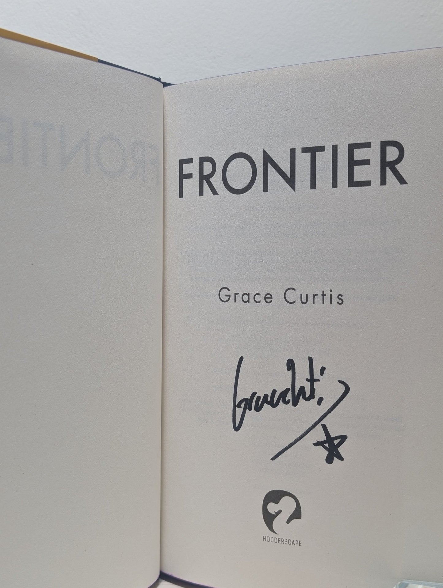 Frontier; Floating Hotel by Grace Curtis (Signed First Edition with sprayed edges) - Fialta Books