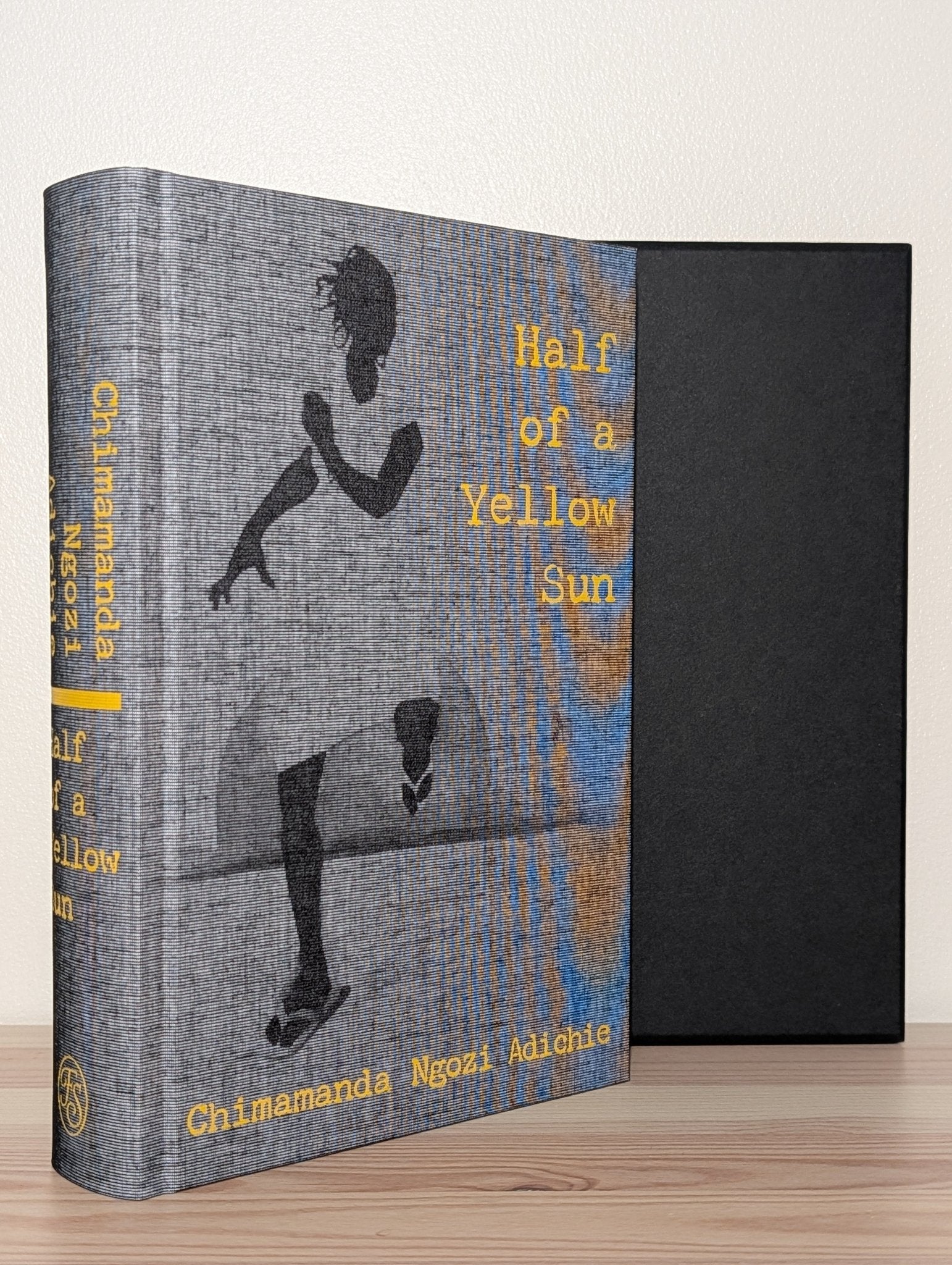 Half of a Yellow Sun by Chimamanda Ngozi Adichie (Folio Slipcase Edition) - Fialta Books