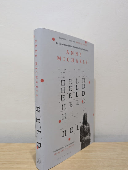 Held by Anne Michaels (First Edition) - Fialta Books
