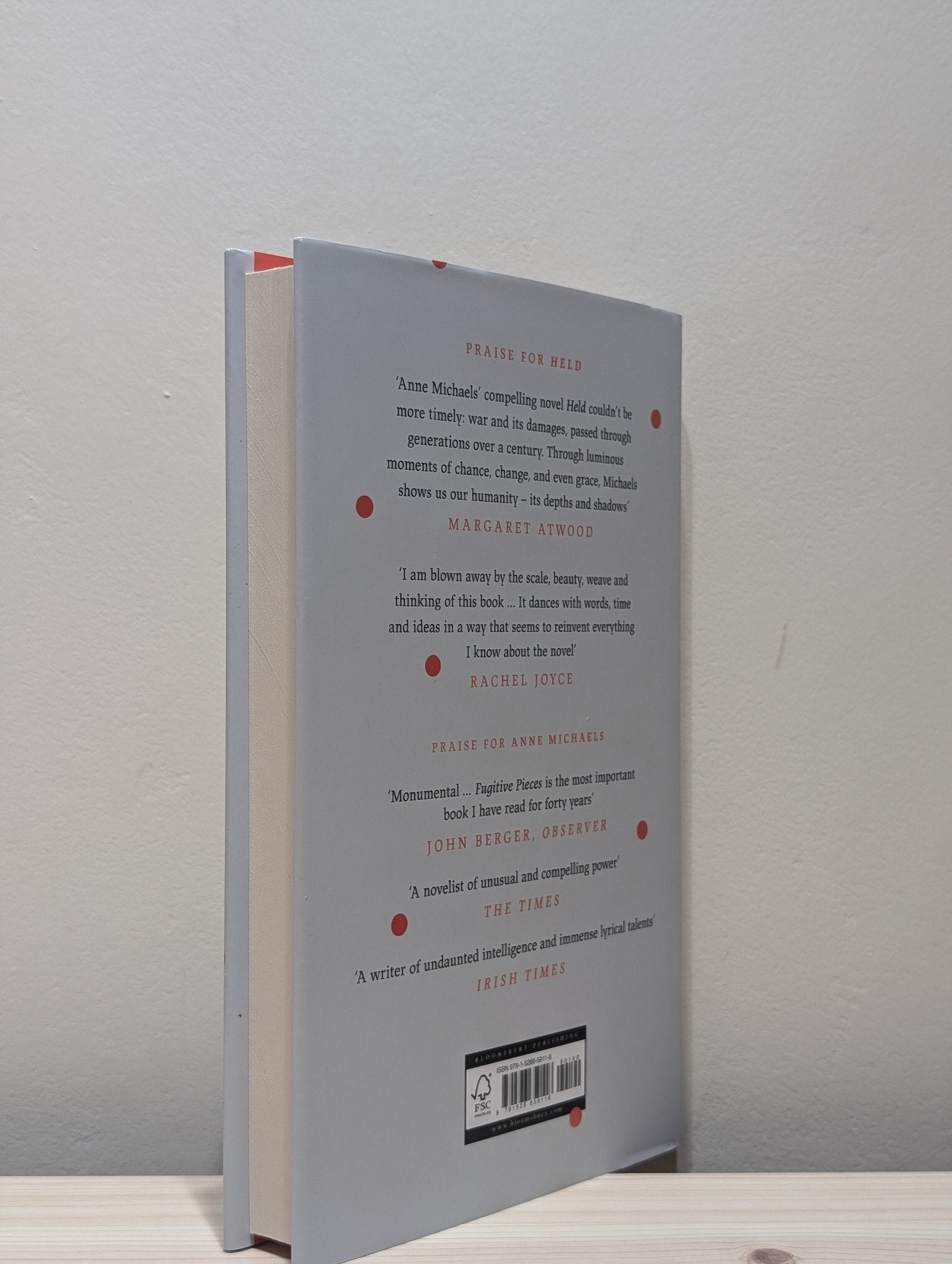 Held by Anne Michaels (Signed Dated First Edition) - Fialta Books